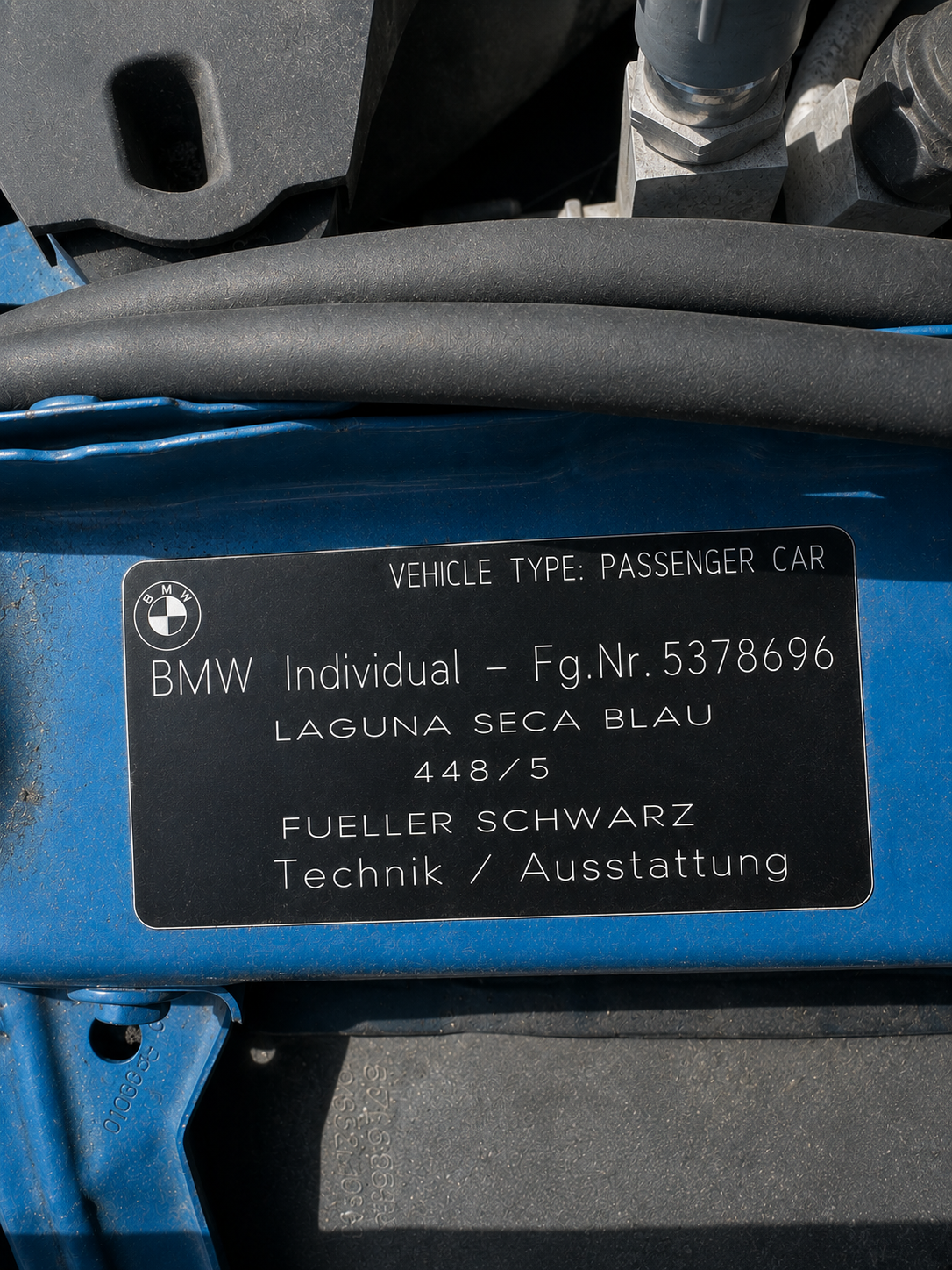 BMW Individual under-hood plaque confirming Laguna Seca Blau 448/5 factory colour